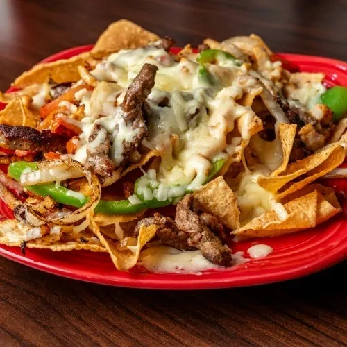 El Agave Mexican Grill and Bar signature dishes Nachos CarbonFajitas NachosPollo Chipotle